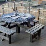 Private deck with stylish outdoor dining setup for relaxed alfresco meals