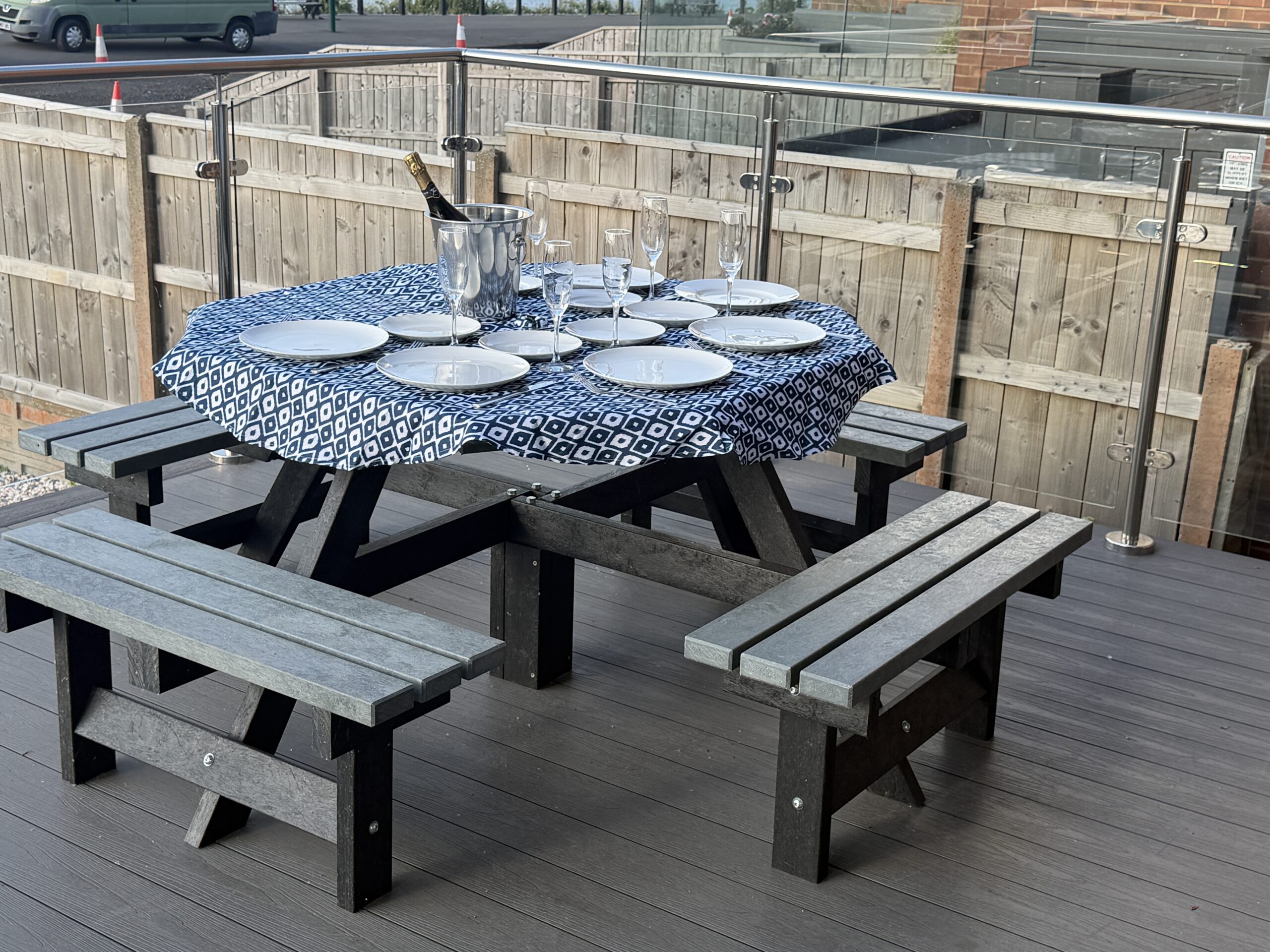 Private deck with stylish outdoor dining setup for relaxed alfresco meals